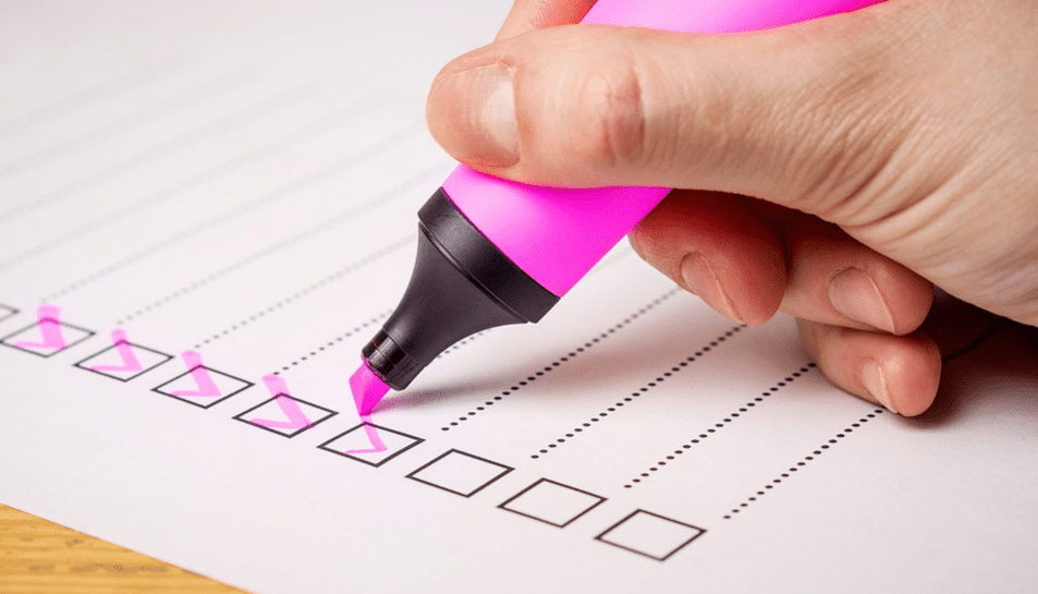 Pink highlighter marking a check list