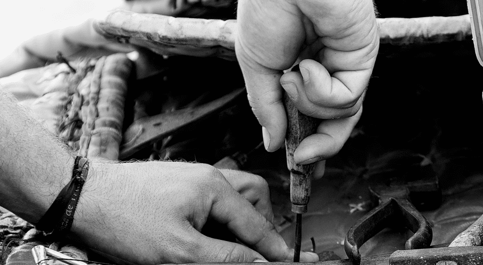 Close-up of a man working with tools