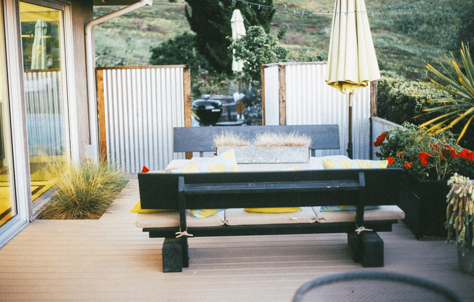 outdoor deck with simple bench and table