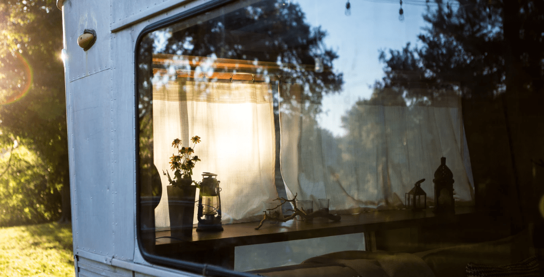 looking through the window of a mobile home from the outside