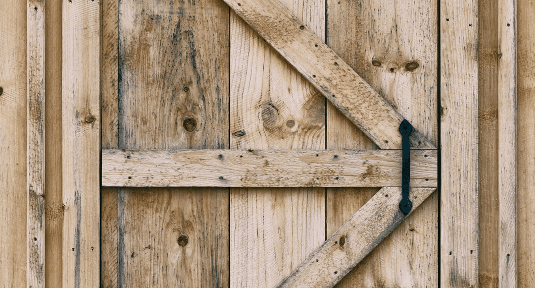 A wooden shed door