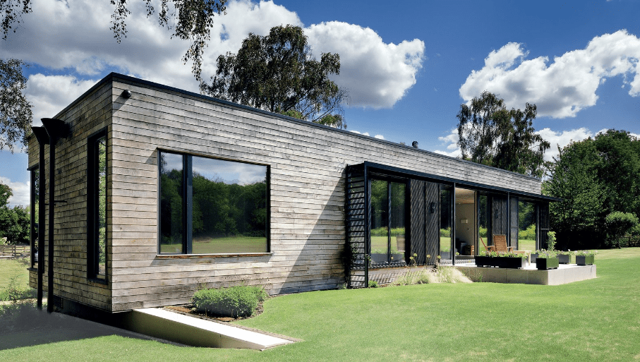 A modern mobile home with wood and steel