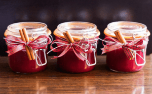 Festive red Christmas candles in jars