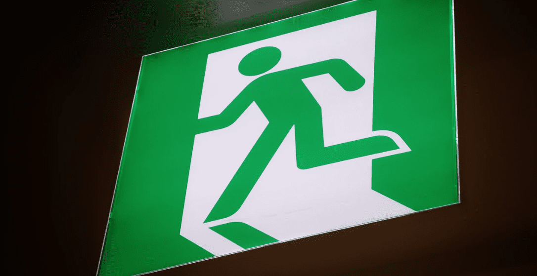 Exit signage, green and white