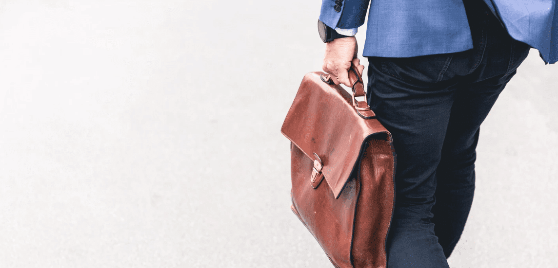 Man walking with leather briefcase