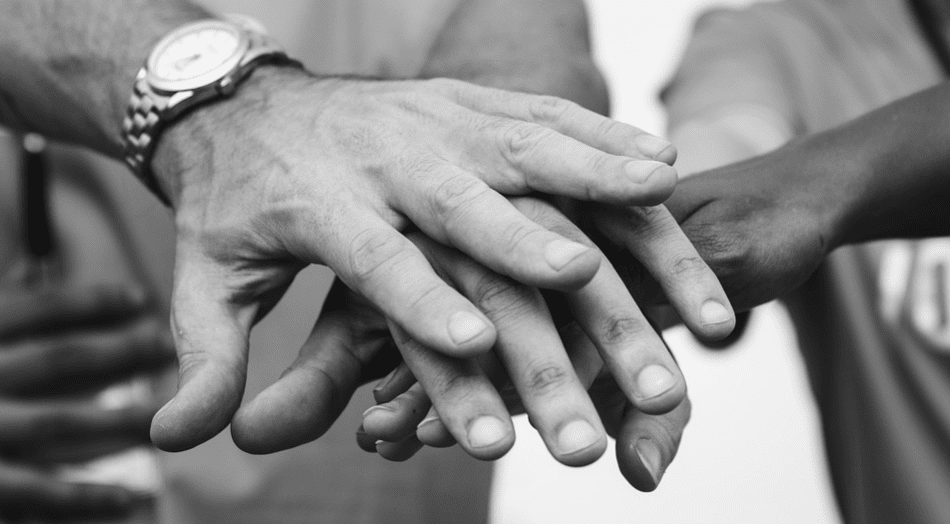 Helping hands in black and white
