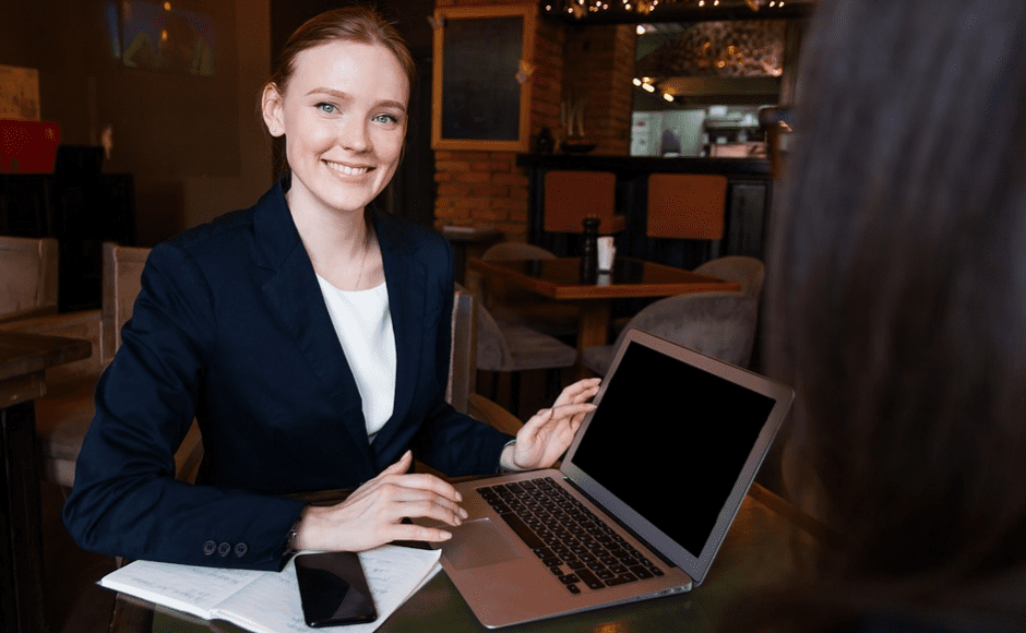 A business woman with her laptop and mobile phone
