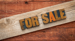 For Sale sign on wood
