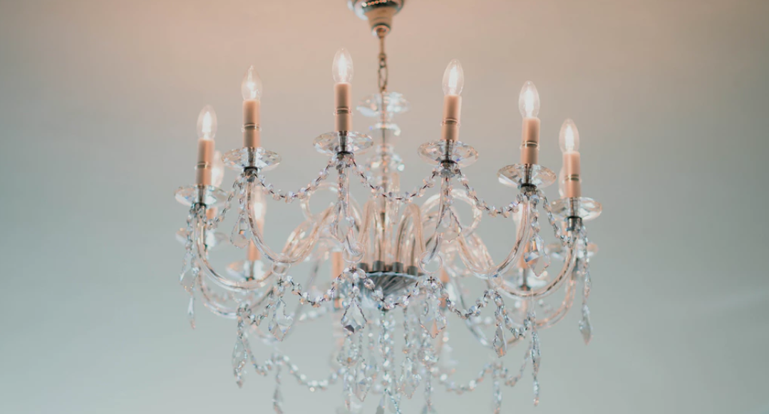 Simple but elegant chandelier suspended from ceiling