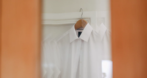 Mirror reflecting hanging shirt