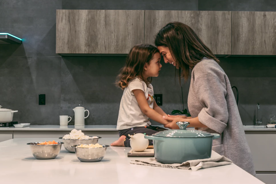 Mother and child in kitchen