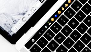 Laptop keyboard with emojis