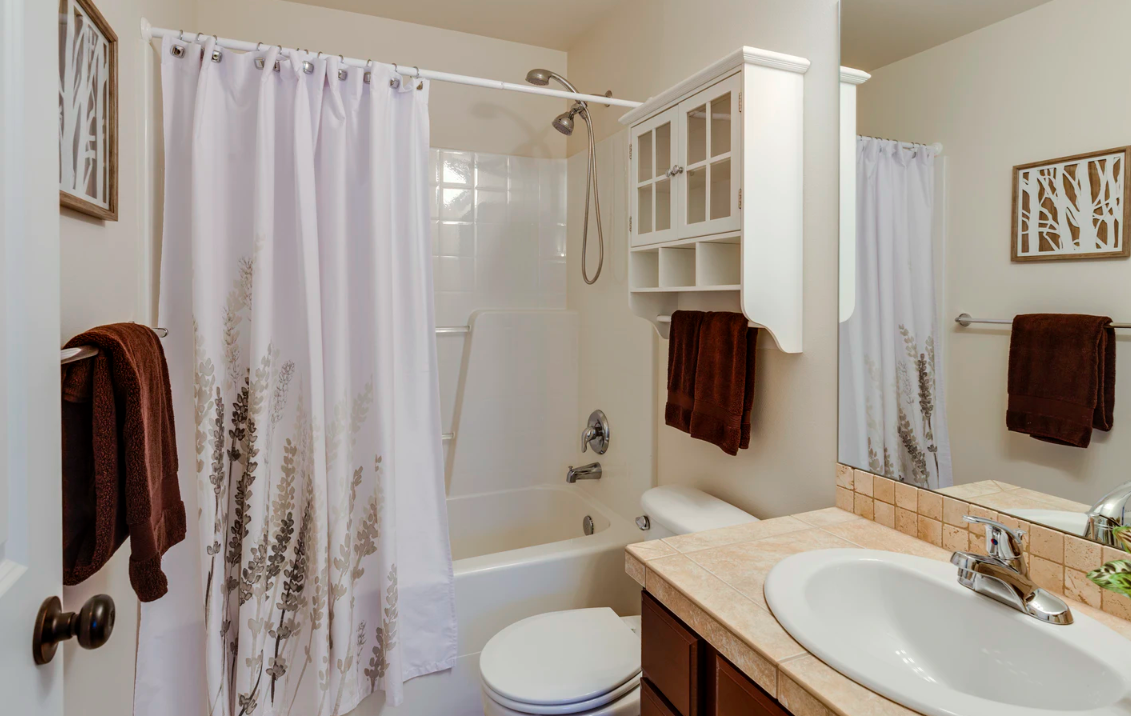 Featured image for "How To Create Built-In Storage In Your Mobile Home Bathroom"