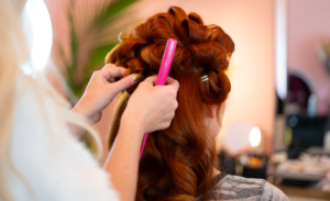 Hairdresser styling curls