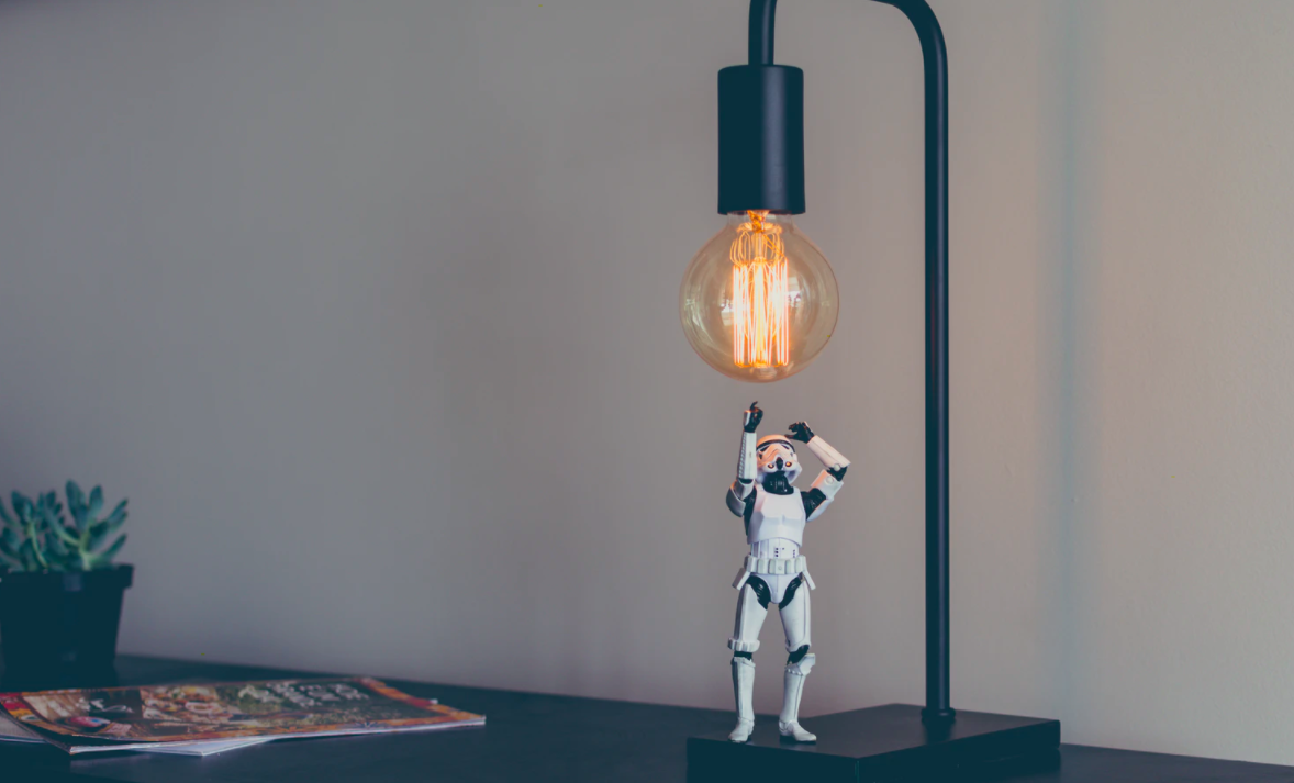 Stormtrooper toy character under light bulb
