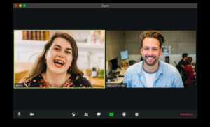 A woman and a man on a Zoom video call